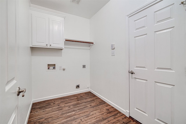 laundry area with cabinet space, dark wood-type flooring, electric dryer hookup, hookup for a washing machine, and baseboards