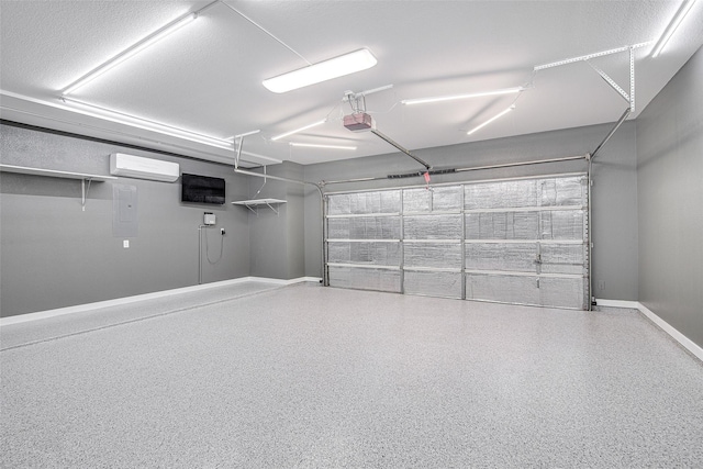 garage featuring an AC wall unit, a garage door opener, and baseboards