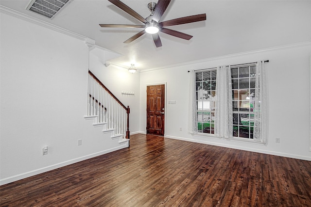 entryway featuring wood finished floors, stairs, ornamental molding, ceiling fan, and visible vents