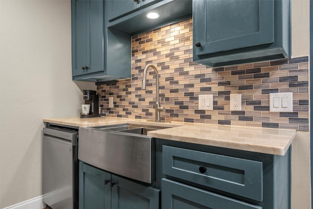 1421 S 12th St, Waco, TX 76706 - kitchen featuring tasteful backsplash, stainless steel dishwasher, and a sink