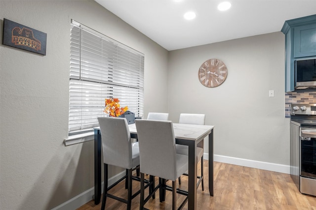 1421 S 12th St, Waco, TX 76706 - dining area featuring baseboards, recessed lighting, and wood finished floors