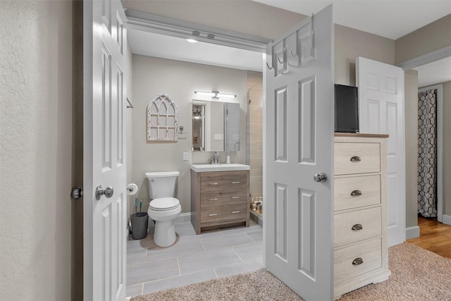 1421 S 12th St, Waco, TX 76706 - bathroom featuring toilet, tile patterned flooring, and vanity