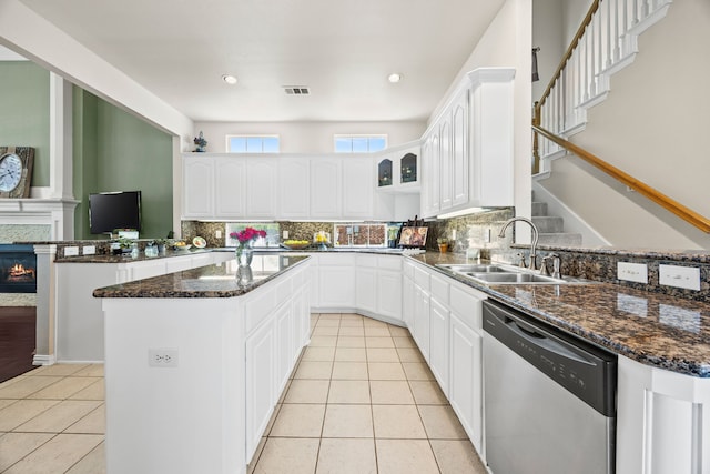9318 Waterview Pkwy, Rowlett, TX 75089 - kitchen featuring dishwasher, a peninsula, a sink, light tile patterned floors, and recessed lighting