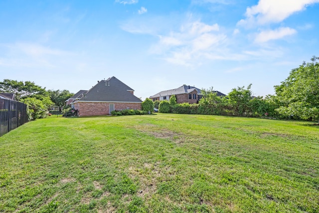 view of yard with fence