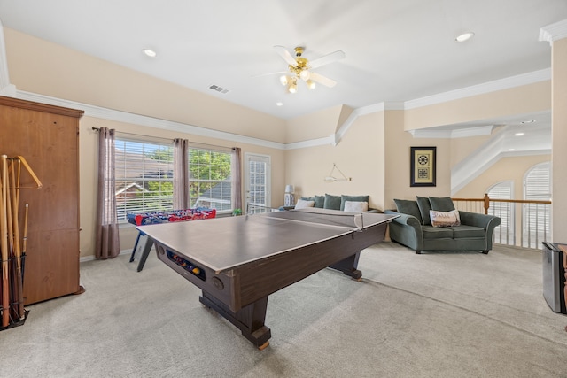 recreation room featuring visible vents, ornamental molding, light colored carpet, recessed lighting, and a ceiling fan