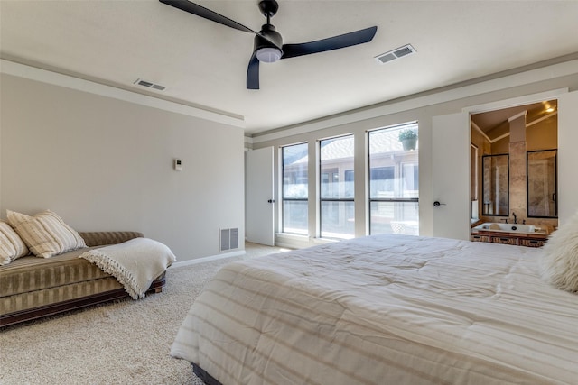 bedroom featuring visible vents, baseboards, and light carpet