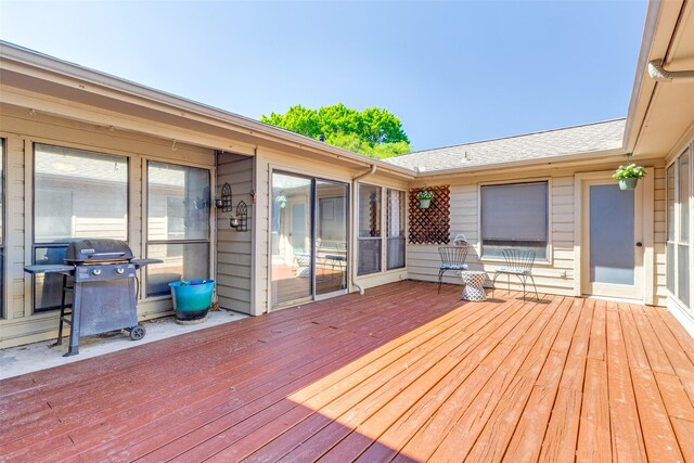 wooden terrace with grilling area