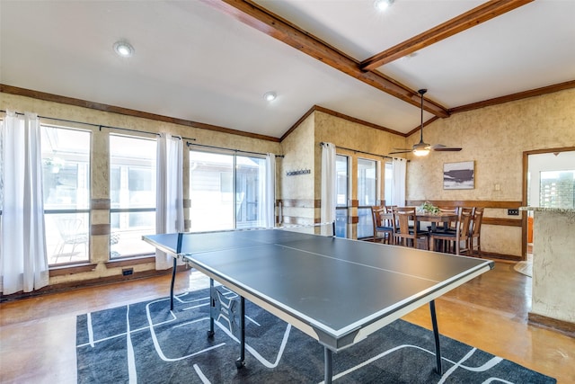 rec room featuring ornamental molding, a ceiling fan, concrete flooring, and vaulted ceiling with beams
