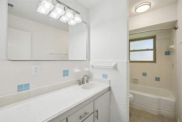 10714 Palace Way, Dallas, TX 75218 - kitchen featuring a sink, decorative backsplash, appliances with stainless steel finishes, and light stone countertops