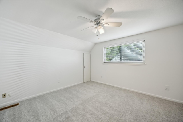 10714 Palace Way, Dallas, TX 75218 - bedroom with a closet, a ceiling fan, baseboards, and light carpet