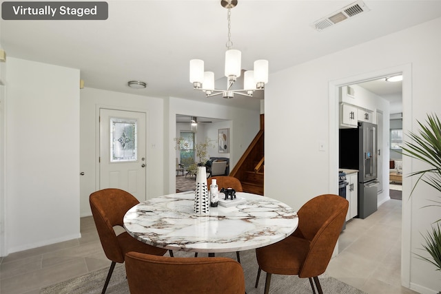 10714 Palace Way, Dallas, TX 75218 - living room with visible vents, a ceiling fan, light wood finished floors, and french doors