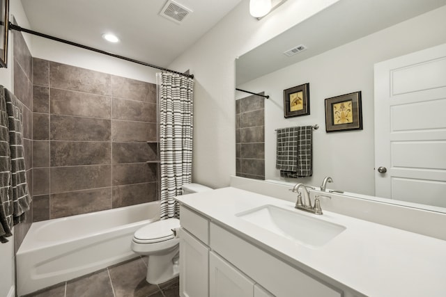 bathroom featuring toilet, shower / bath combination with curtain, visible vents, and tile patterned floors