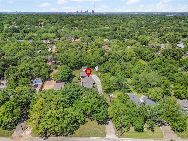 bird's eye view featuring a forest view