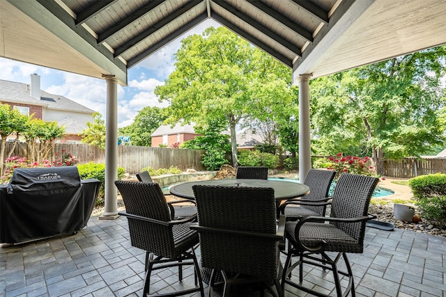 view of patio / terrace featuring outdoor dining area and a fenced backyard