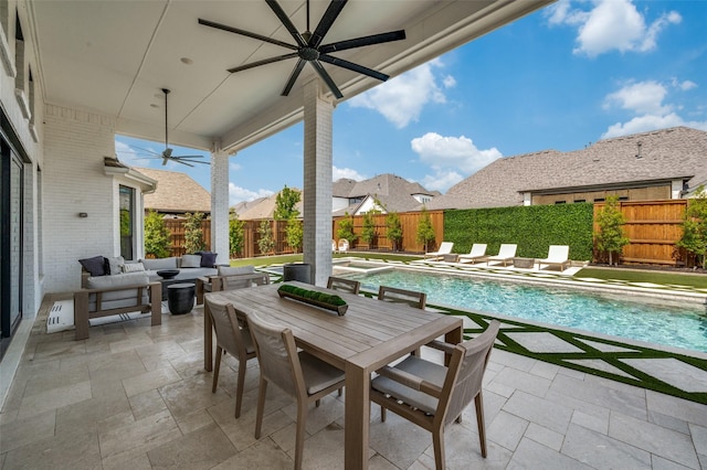 view of patio / terrace featuring a fenced in pool, ceiling fan, a fenced backyard, outdoor lounge area, and outdoor dining space