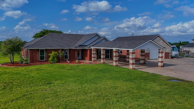 ranch-style house with driveway, a shingled roof, a front yard, an attached garage, and brick siding