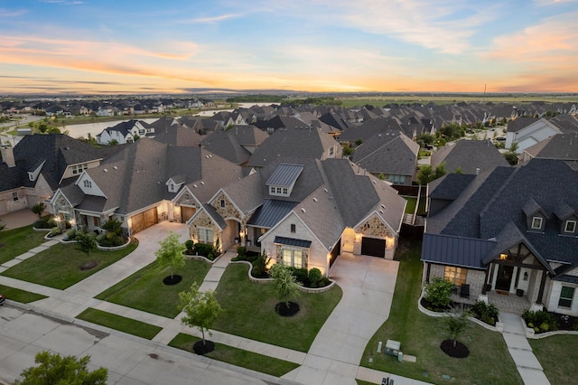 aerial view at dusk with a residential view