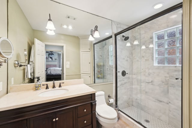 ensuite bathroom featuring ensuite bath, toilet, vanity, visible vents, and a stall shower