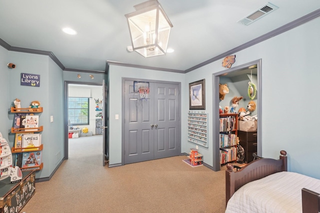 bedroom featuring crown molding, a closet, visible vents, and carpet floors