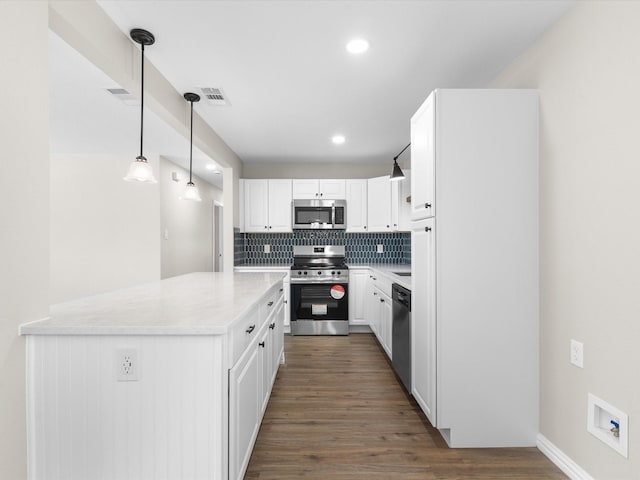 4451 Hardy St, Fort Worth, TX 76106 - kitchen featuring stainless steel appliances, white cabinets, backsplash, dark wood-style floors, and visible vents