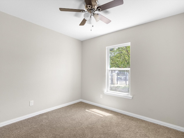 4451 Hardy St, Fort Worth, TX 76106 - carpeted empty room featuring baseboards and a ceiling fan
