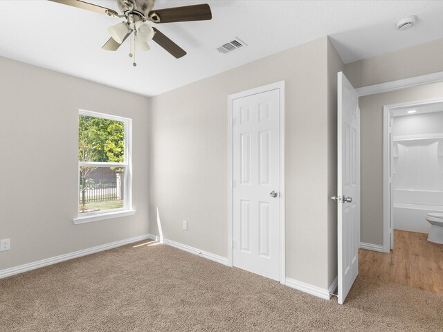 4451 Hardy St, Fort Worth, TX 76106 - unfurnished bedroom with a ceiling fan, visible vents, carpet floors, and baseboards