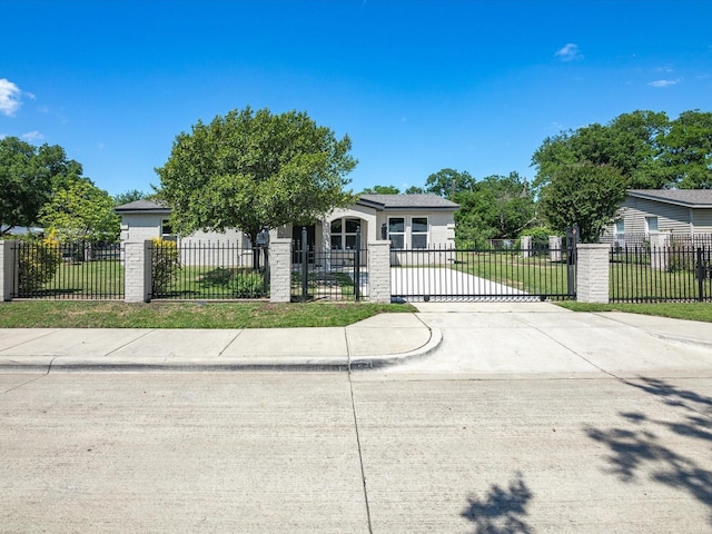 4451 Hardy St, Fort Worth, TX 76106 - view of front of house featuring a front yard, a fenced front yard, and concrete driveway