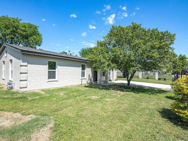 4451 Hardy St, Fort Worth, TX 76106 - exterior space with a lawn and fence