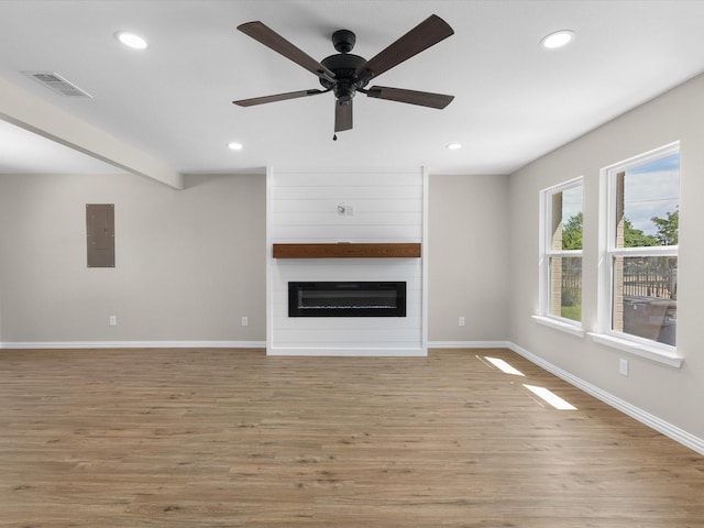 4451 Hardy St, Fort Worth, TX 76106 - unfurnished living room with light wood finished floors, recessed lighting, visible vents, and baseboards