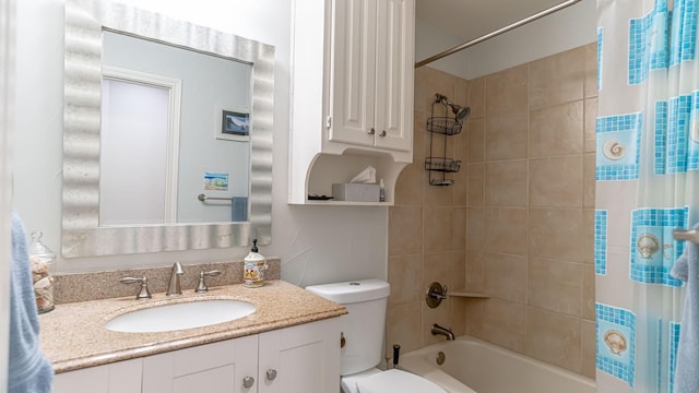 full bathroom featuring toilet, vanity, and shower / tub combo with curtain