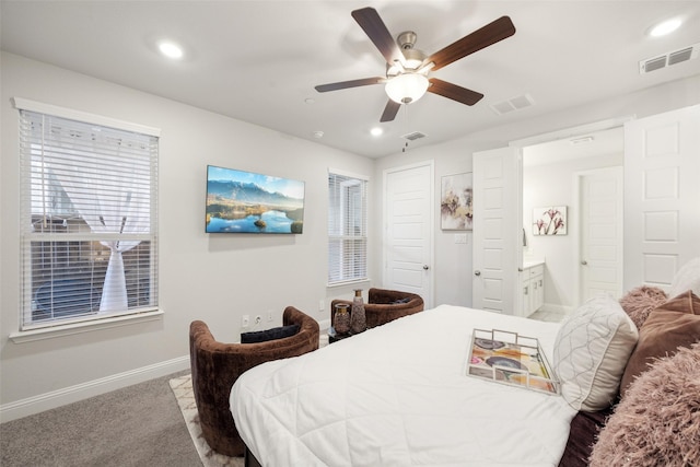 carpeted bedroom featuring recessed lighting, visible vents, and baseboards