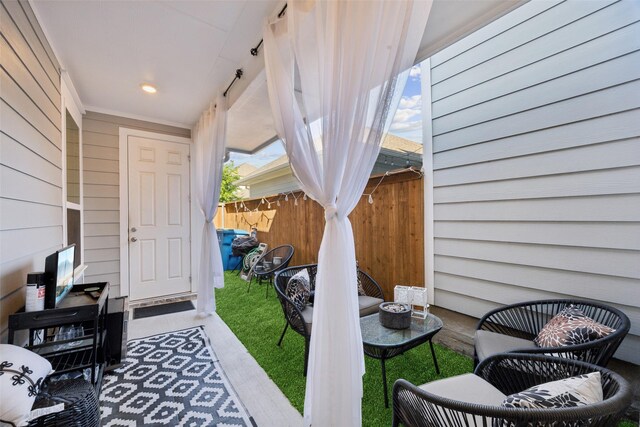view of patio with fence