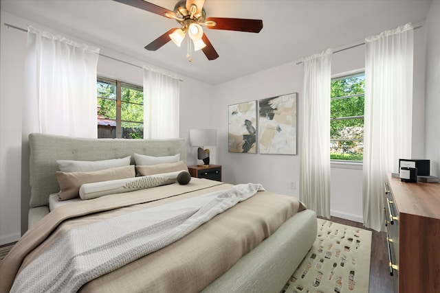 5816 Sandra Dr, Fort Worth, TX 76133 - bedroom with baseboards, a ceiling fan, and wood finished floors