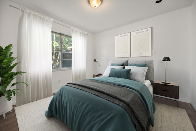5816 Sandra Dr, Fort Worth, TX 76133 - bedroom with baseboards and wood finished floors