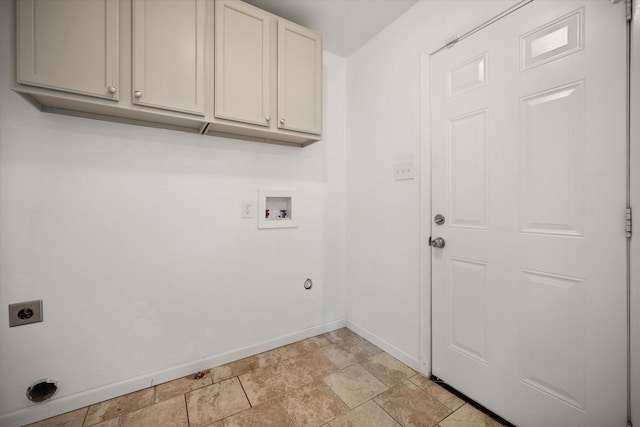 5816 Sandra Dr, Fort Worth, TX 76133 - clothes washing area featuring baseboards, stone finish floor, electric dryer hookup, cabinet space, and washer hookup
