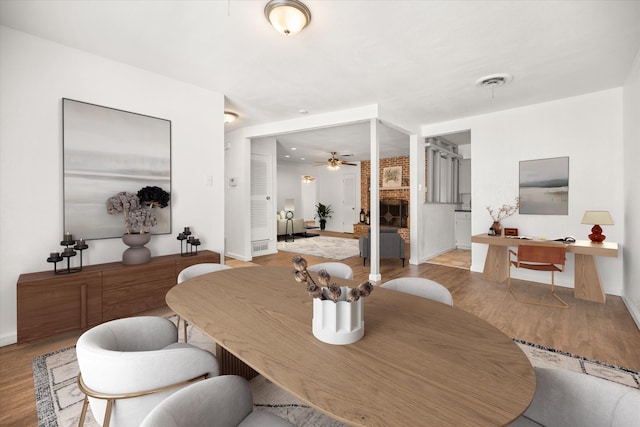 5816 Sandra Dr, Fort Worth, TX 76133 - dining area with baseboards, ceiling fan, wood finished floors, and visible vents