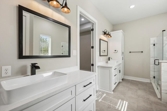 328 Brandon Way, Pottsboro, TX 75076 - full bathroom featuring a shower stall, two vanities, and recessed lighting