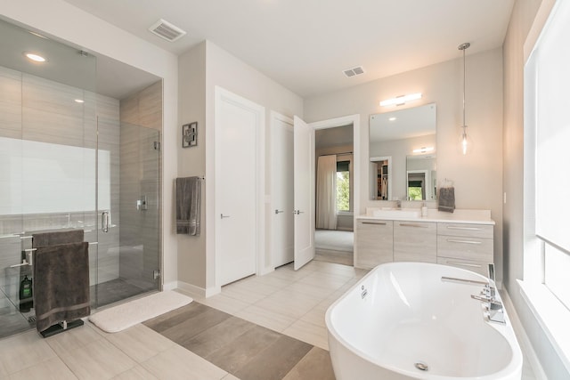 3901 Campania Ct, Colleyville, TX 76034 - walk in closet featuring light tile patterned floors and visible vents