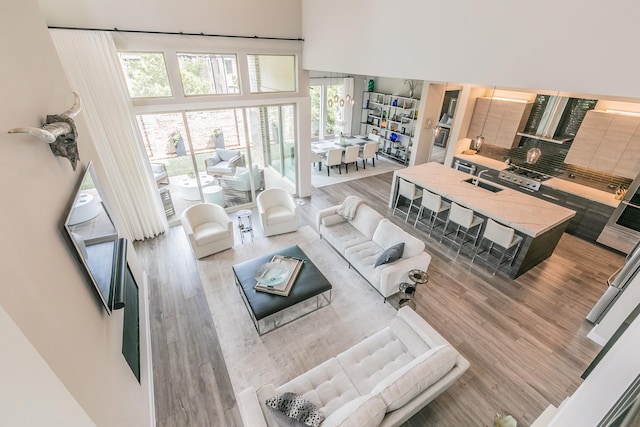 3901 Campania Ct, Colleyville, TX 76034 - living area with a high ceiling and light wood-type flooring