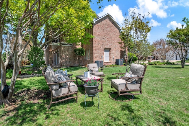view of yard with an outdoor hangout area and cooling unit