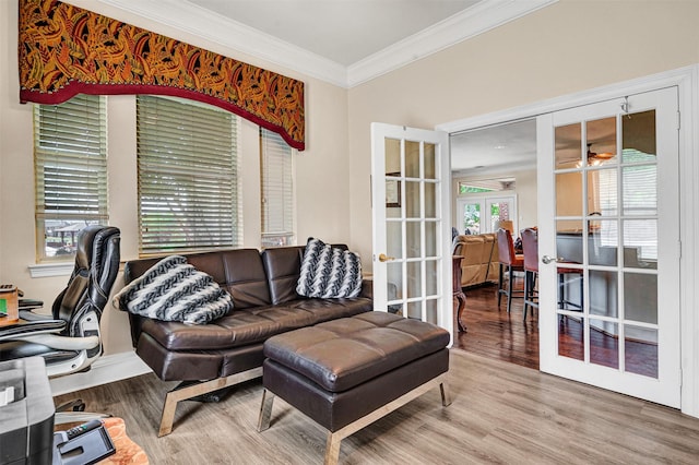 office featuring ornamental molding, french doors, and wood finished floors