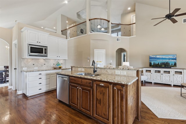 12248 Langley Hill Dr, Fort Worth, TX 76244 - kitchen featuring a sink, appliances with stainless steel finishes, custom exhaust hood, and white cabinetry