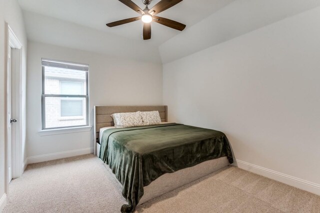 bedroom featuring ceiling fan, carpet, and baseboards