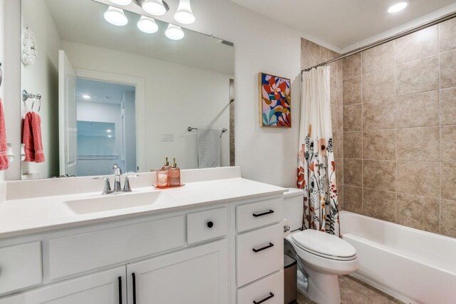 full bathroom featuring recessed lighting, shower / bathtub combination with curtain, vanity, toilet, and visible vents