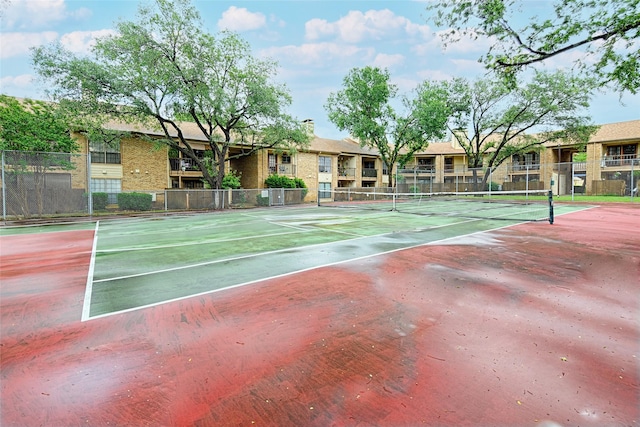 view of sport court featuring fence and community basketball court