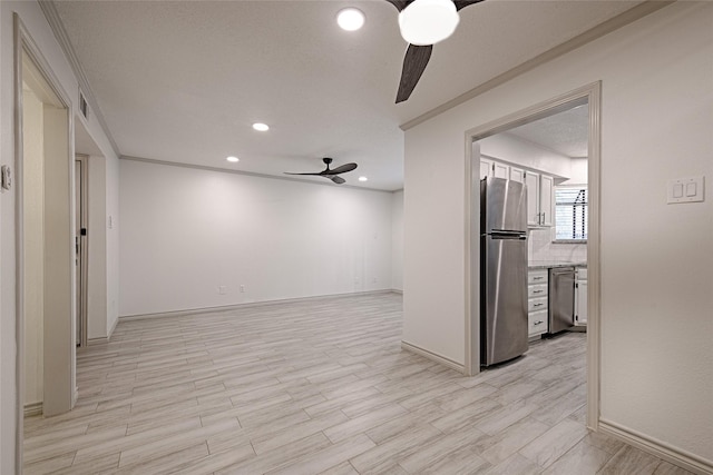 spare room featuring recessed lighting, a ceiling fan, visible vents, and baseboards