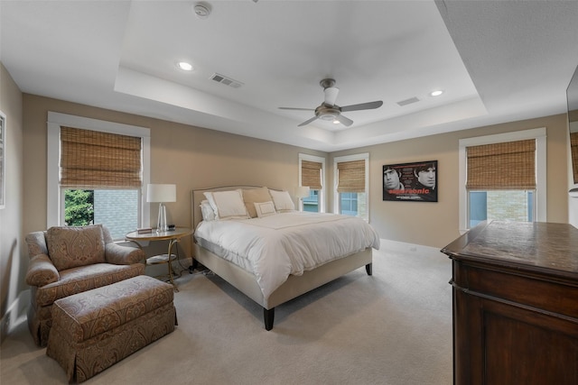 5313 Ridgedale Ave, Dallas, TX 75206 - bedroom featuring a raised ceiling, light carpet, baseboards, ceiling fan, and recessed lighting