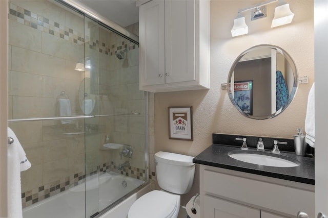 5313 Ridgedale Ave, Dallas, TX 75206 - full bath featuring vanity, toilet, and shower / bath combination with glass door