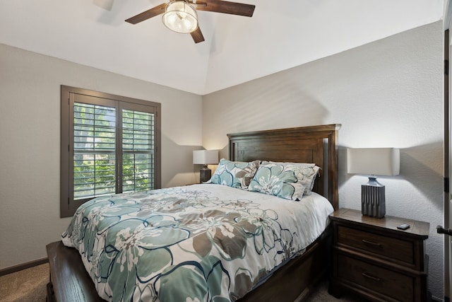 carpeted bedroom with baseboards, ceiling fan, and lofted ceiling