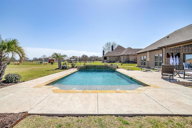 pool with fence, a yard, and a patio